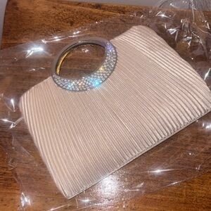 Elegant Cream Clutch with Silver Accents